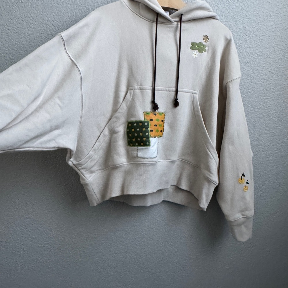 Nike women’s hoodie with Patchwork Design, size XS